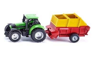 Traktor mit Pöttinger Ladewagen