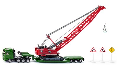 Schwertransport mit Seilbagger und Begleitfahrzeug